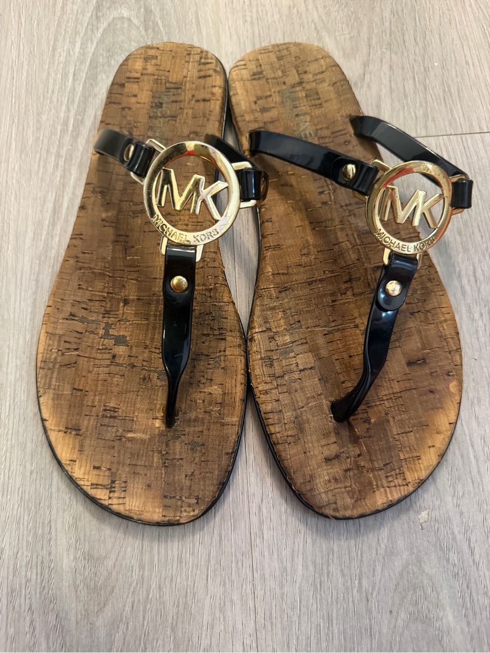Michael Kors Black Patent Thong Sandals with Gold MK Medallions